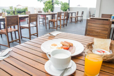 Fresh coffee, toast, eggs, and juice served at a local breakfast spot in Wisconsin