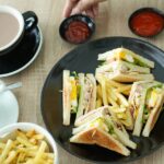 breakfast sandwiches at coffee shops served with coffee for a quick morning meal