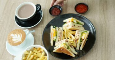 breakfast sandwiches at coffee shops served with coffee for a quick morning meal