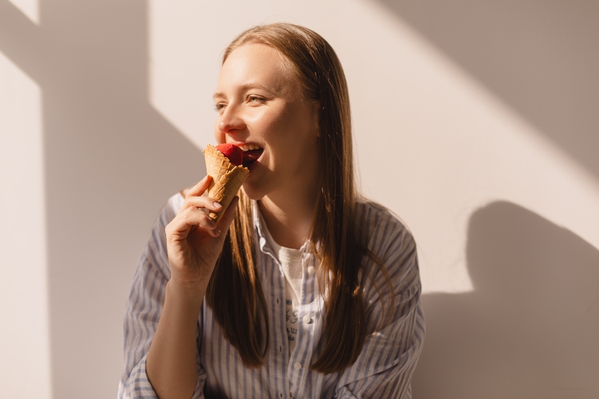 Woman enjoying ice cream in Verona WI at Icki Sticki Cafe